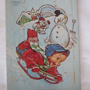 1950's Kiddieland Frame Tray Puzzle #1447-f: Snow Sledding Boy w/ dog & Snowman
